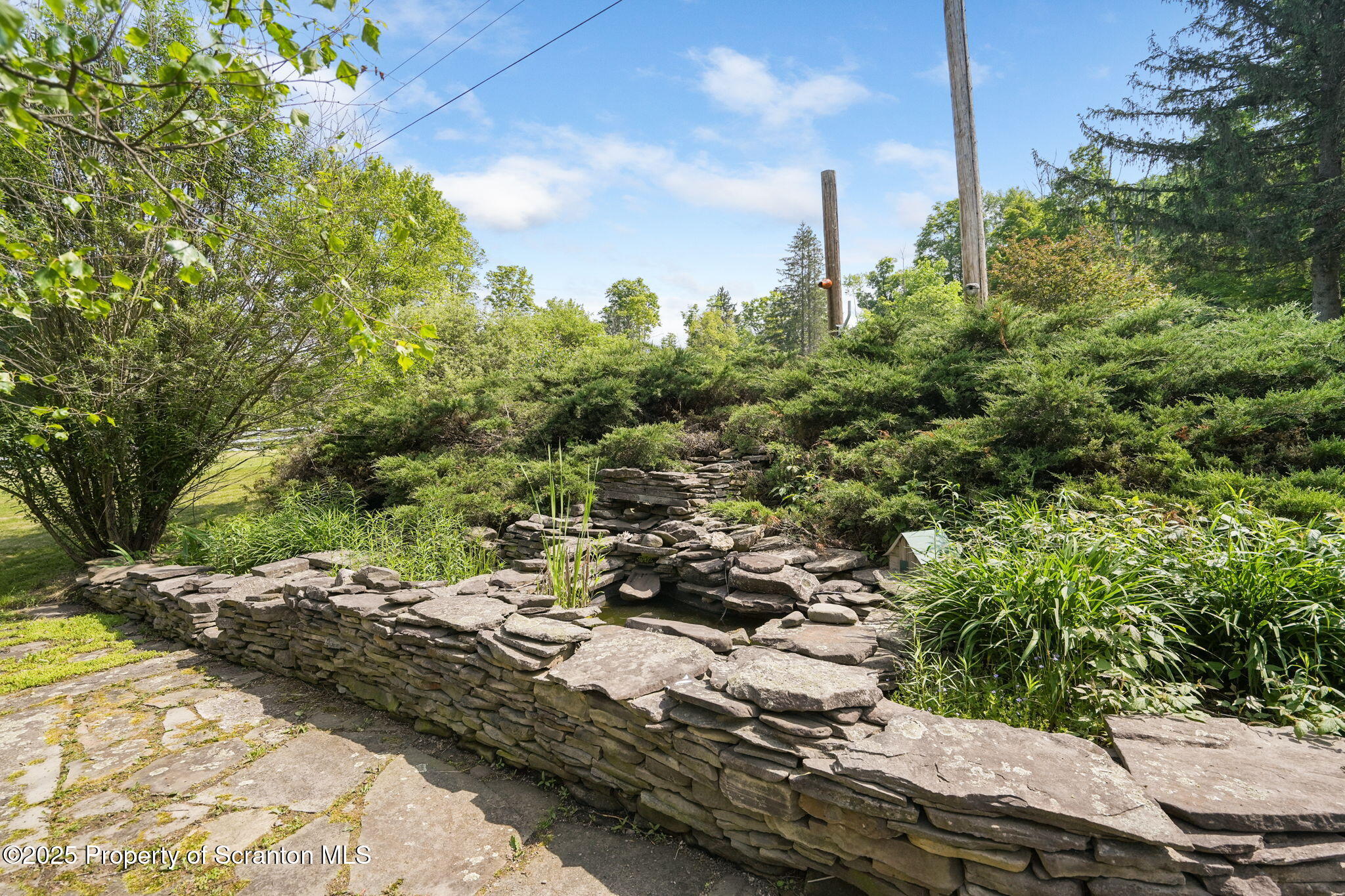 17512 Highway 267 Montrose, PA 18801 - Photo 26 of 28 Rear patio/garden area