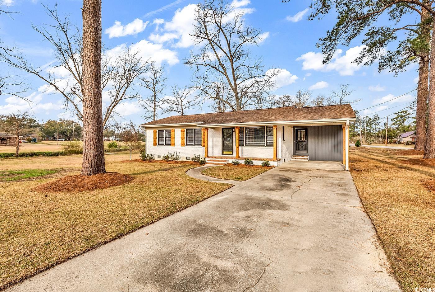 4320 Stevens Street Loris, SC 29569 - Photo 1 of 33 Single story home featuring a carport, concrete dr