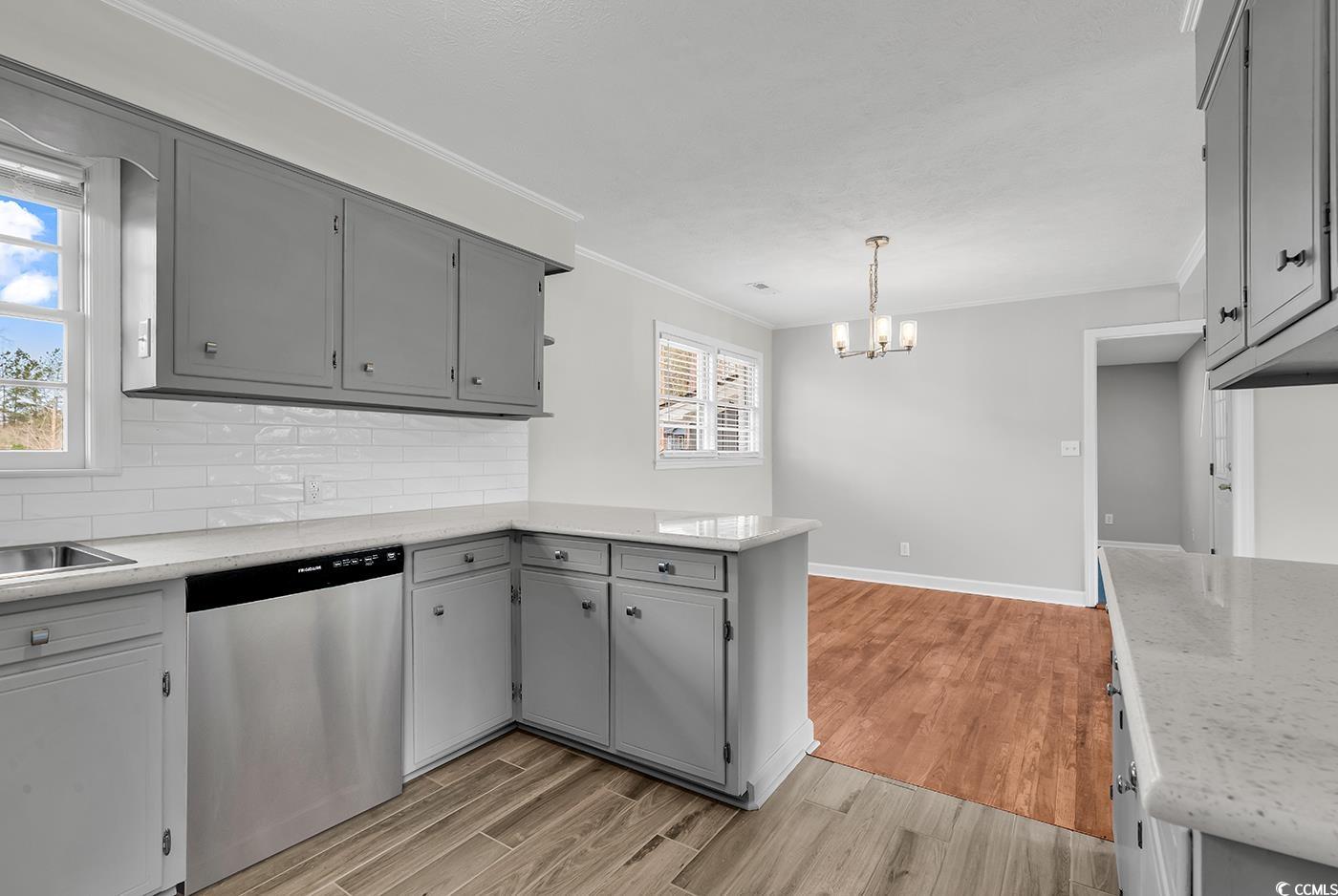 4320 Stevens Street Loris, SC 29569 - Photo 14 of 33 Kitchen with light wood-style flooring, gray cabin