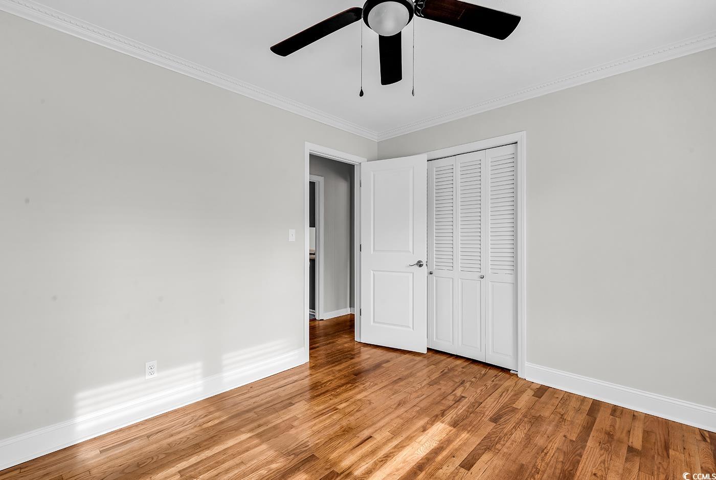 4320 Stevens Street Loris, SC 29569 - Photo 17 of 33 Unfurnished bedroom with a closet, crown molding,