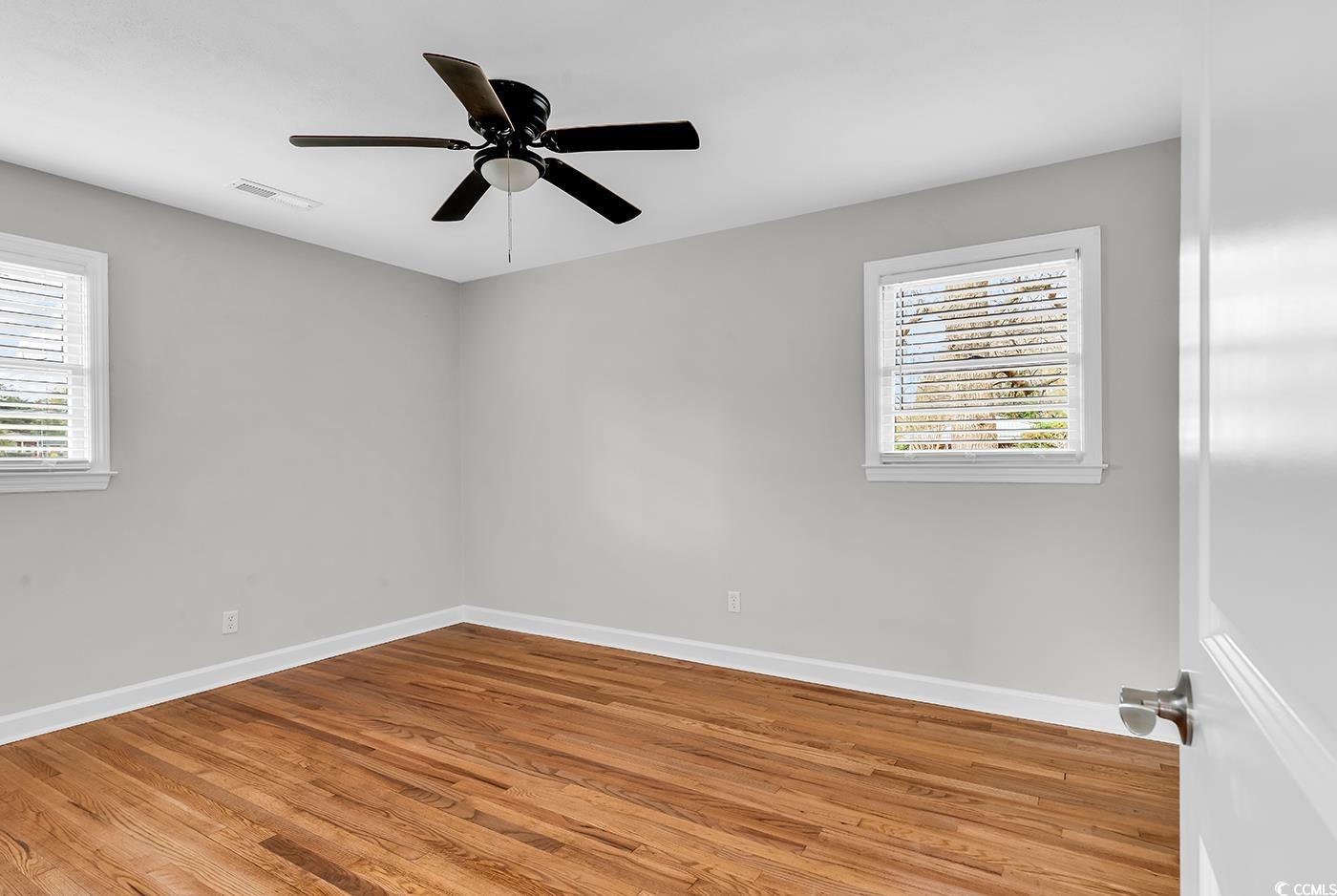 4320 Stevens Street Loris, SC 29569 - Photo 18 of 33 Spare room with visible vents, plenty of natural l