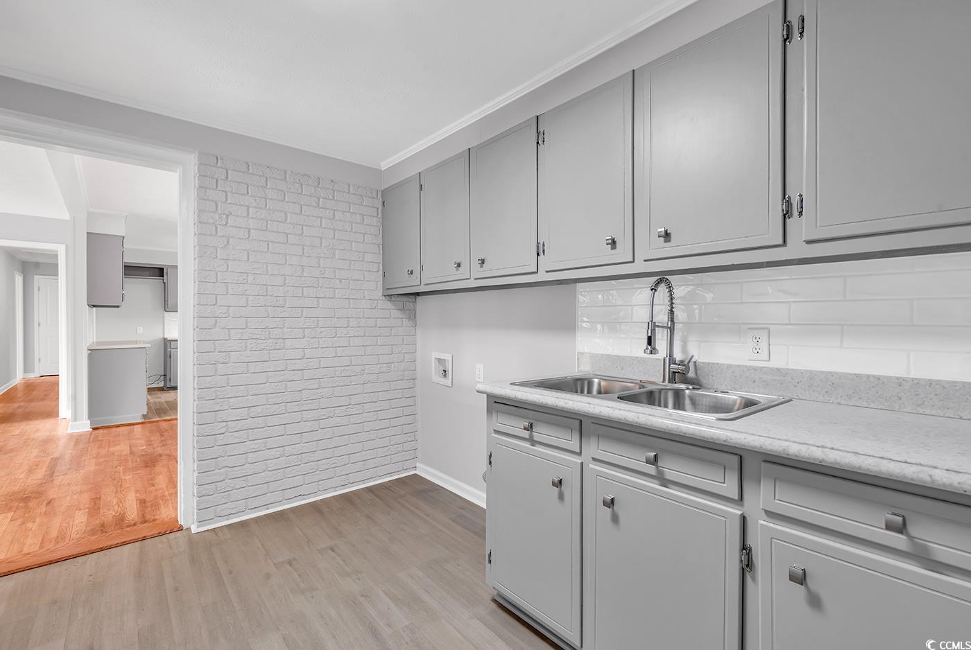 4320 Stevens Street Loris, SC 29569 - Photo 23 of 33 Kitchen featuring light wood-type flooring, gray c