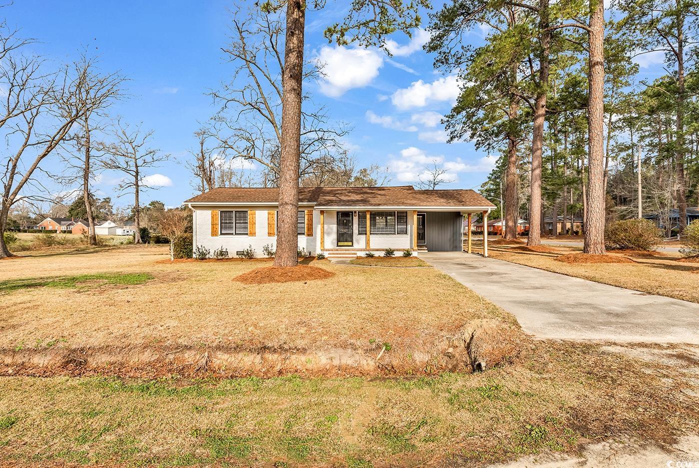 4320 Stevens Street Loris, SC 29569 - Photo 27 of 33 View of front of house with an attached carport, c