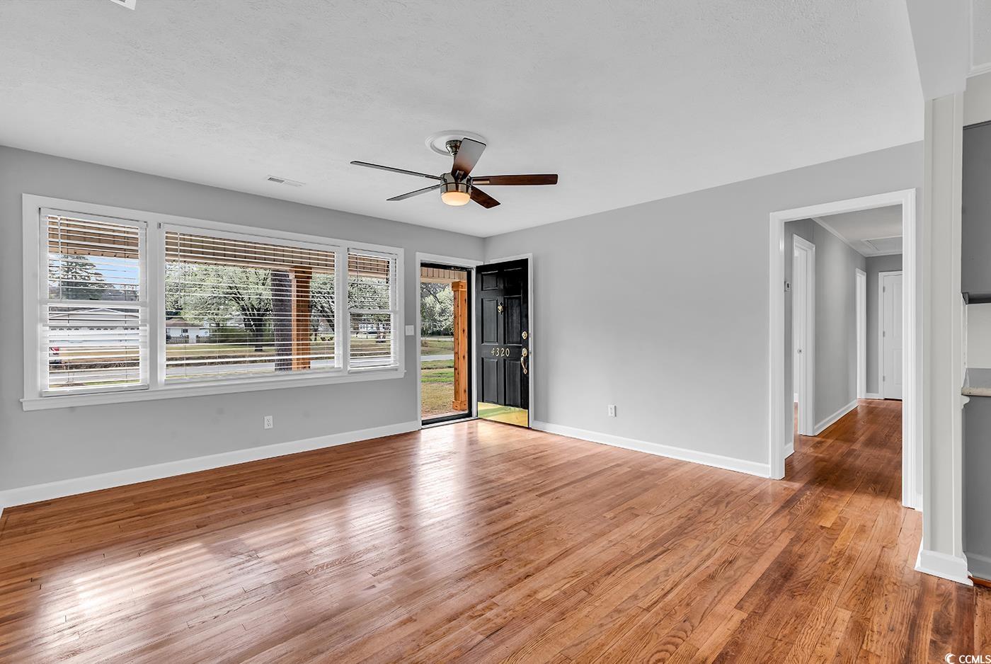 4320 Stevens Street Loris, SC 29569 - Photo 4 of 33 Unfurnished room featuring light wood-style floori