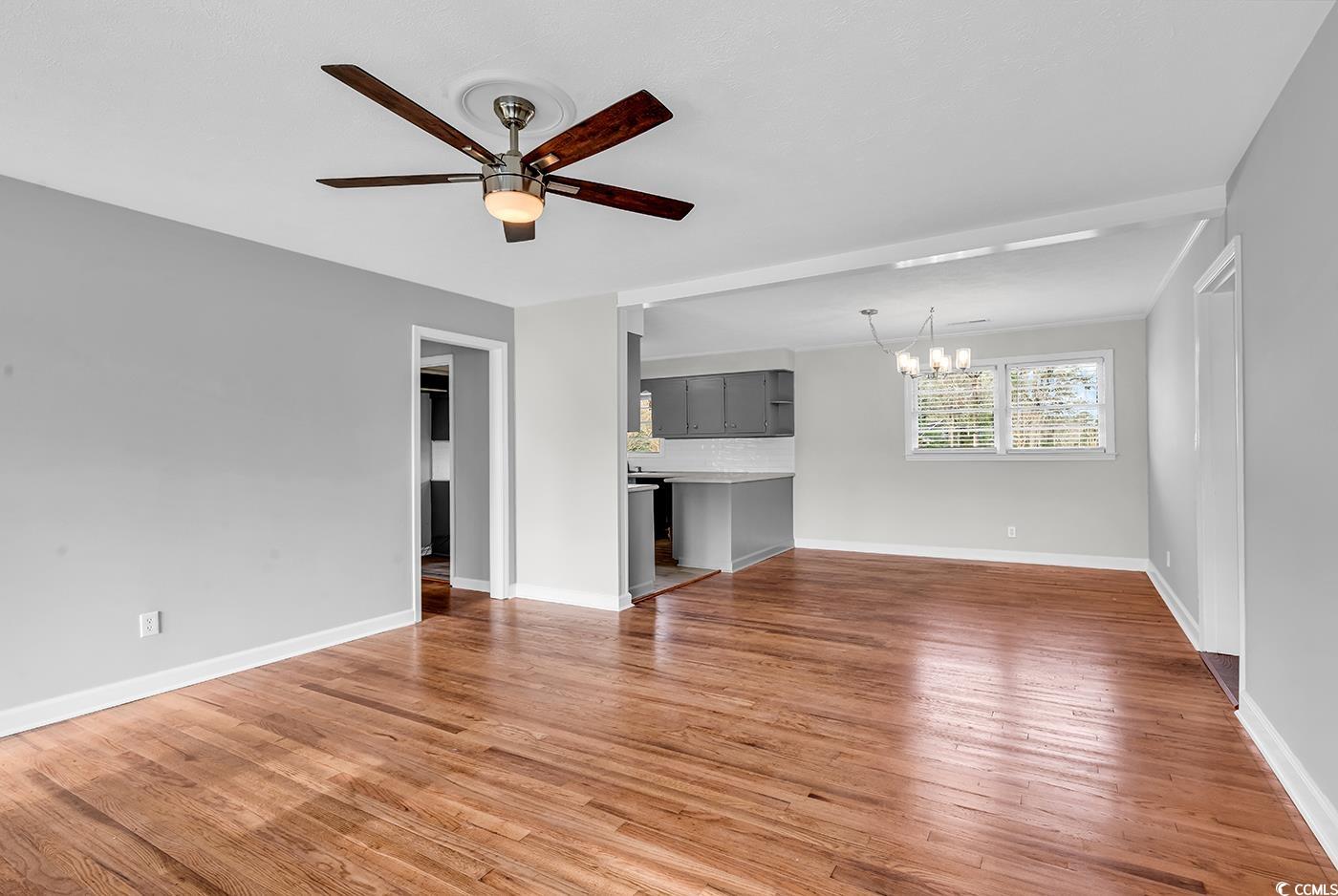 4320 Stevens Street Loris, SC 29569 - Photo 7 of 33 Unfurnished living room featuring light wood-style