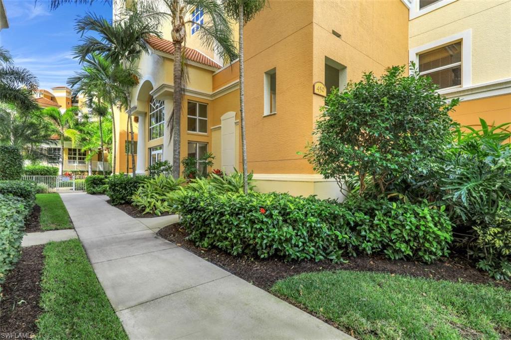 a view of a building with a yard
