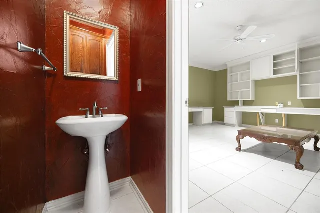 a front view of house with yard and garage