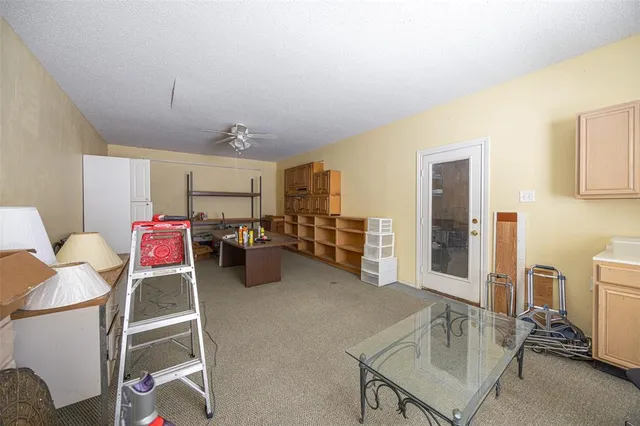 a view of a playground with basketball court