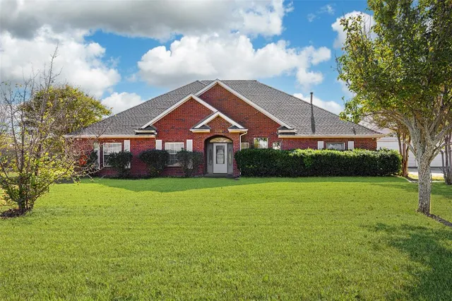 a view of a livingroom with furniture and a fireplace