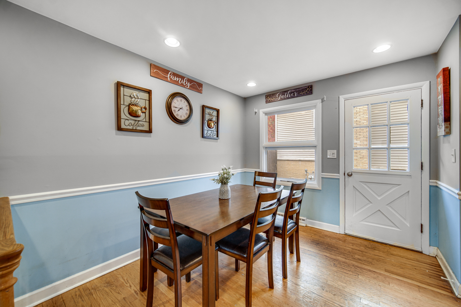 533 Drake Street Libertyville, IL 60048 - Photo 13 of 43 a view of a dining room with furniture and wooden floor