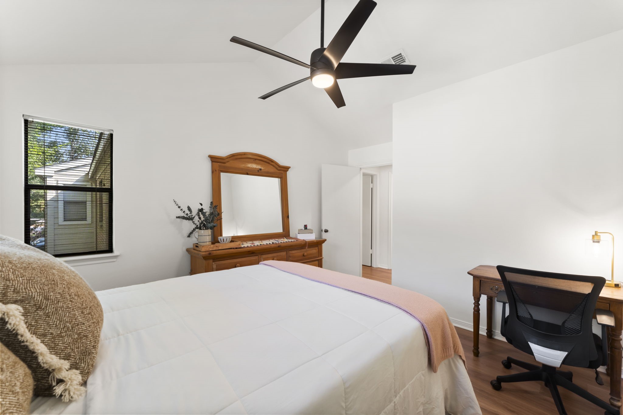3500 Tangle Brush Drive, Unit 178 Spring, TX 77381 - Photo 29 of 42 a bedroom with a bed and a chair