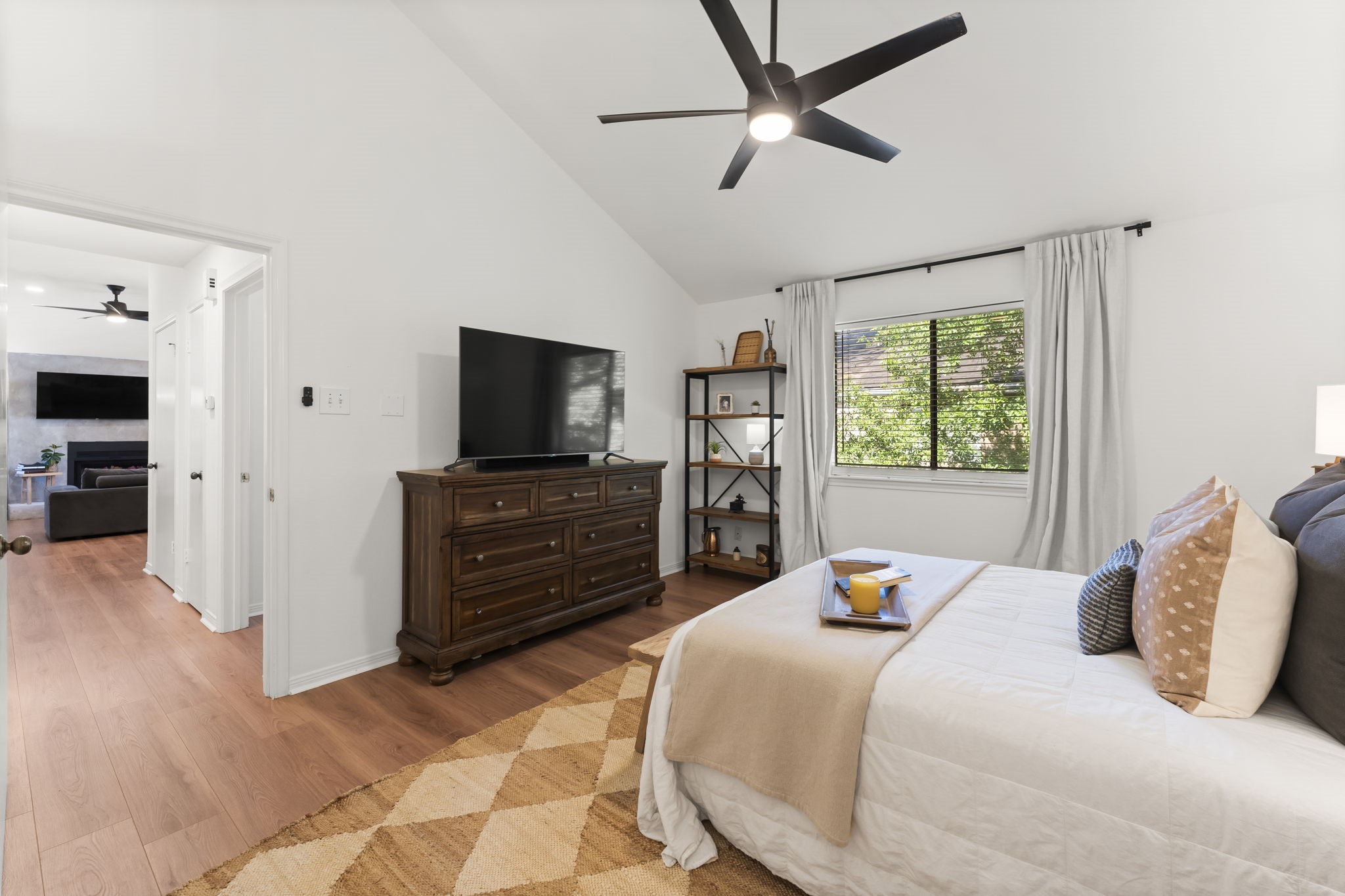 3500 Tangle Brush Drive, Unit 178 Spring, TX 77381 - Photo 33 of 42 a bedroom with a bed and a flat screen tv