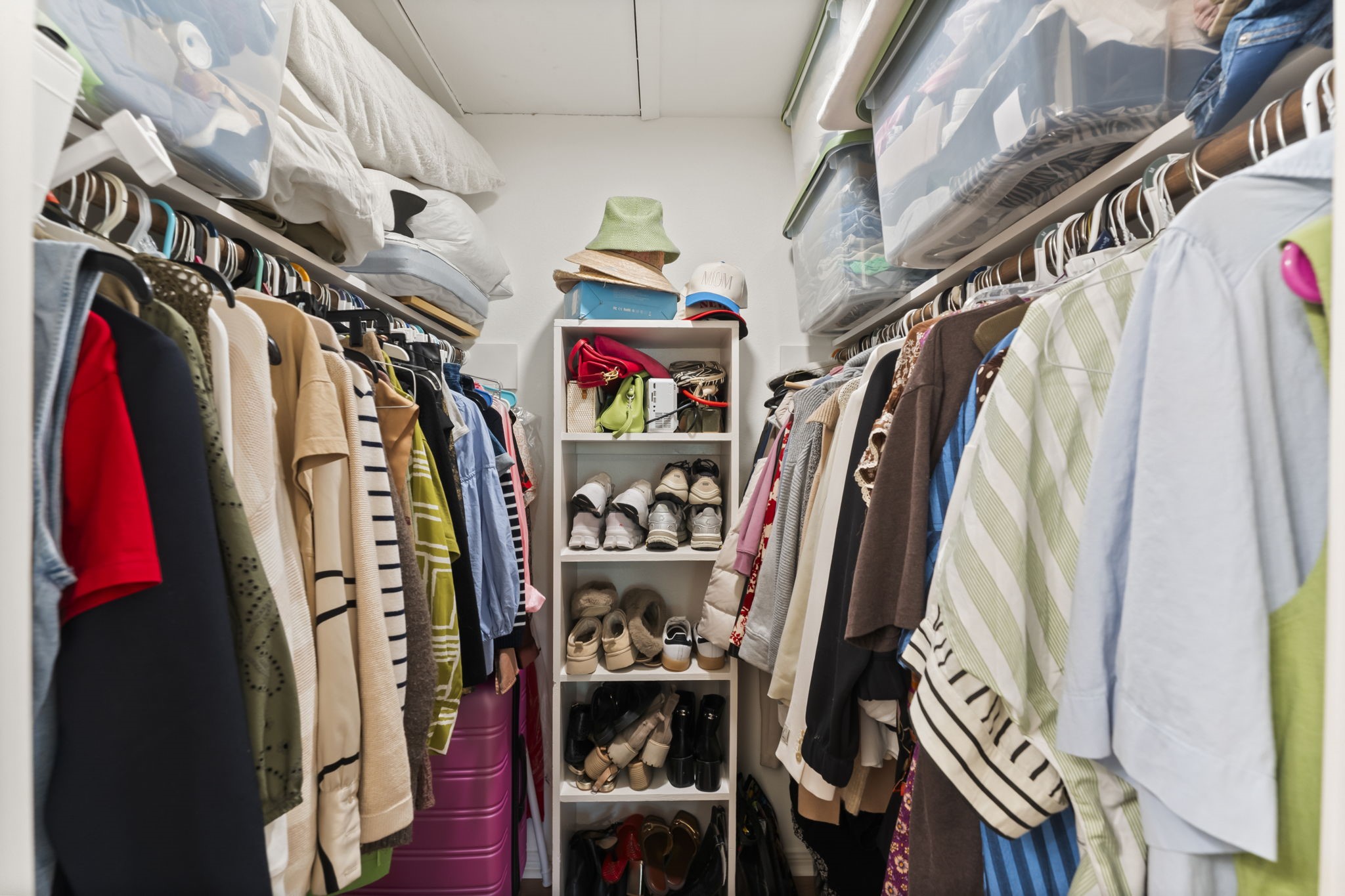 3500 Tangle Brush Drive, Unit 178 Spring, TX 77381 - Photo 38 of 42 a view of walk in closet with clothes and shoes