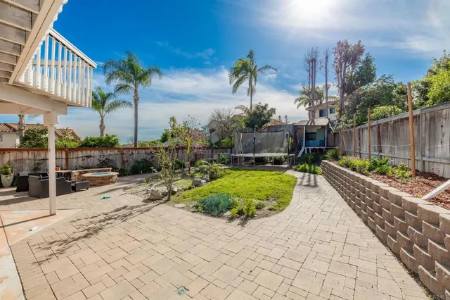 a view of a backyard with plants