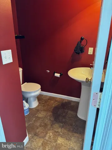 a bathroom with a toilet