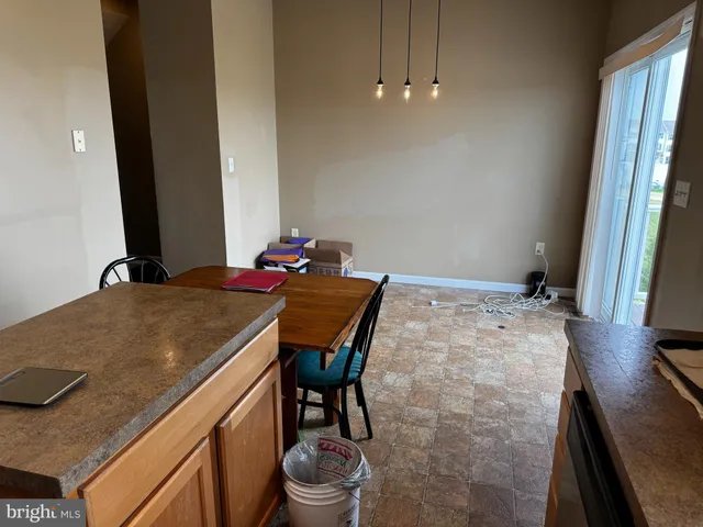 a workspace with furniture and window