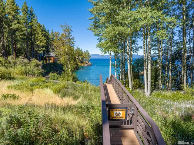 a view of a lake view with a big yard