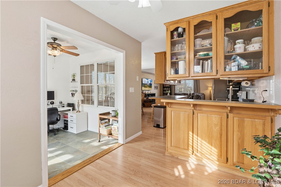 412 West Champain Street Eldon, MO 65026 - Photo 11 of 32 Solid oak panels follow the base cabinets around t