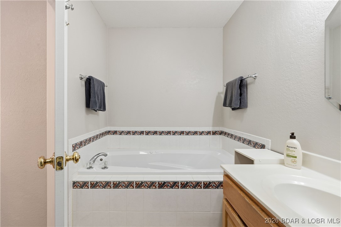 412 West Champain Street Eldon, MO 65026 - Photo 18 of 32 Soak the stress of the day away in your tiled, jet