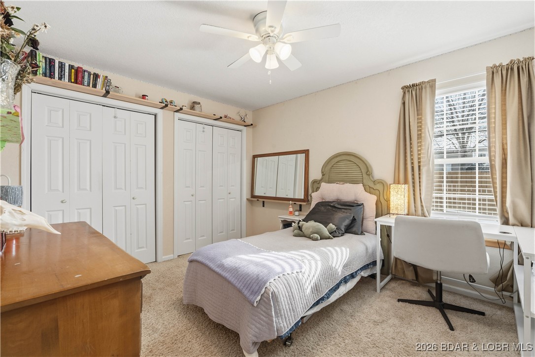 412 West Champain Street Eldon, MO 65026 - Photo 19 of 32 Guest bedroom #1 offers extra storage with two lig
