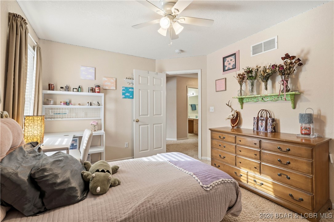 412 West Champain Street Eldon, MO 65026 - Photo 20 of 32 Loads of natural light, this bedroom can accommoda
