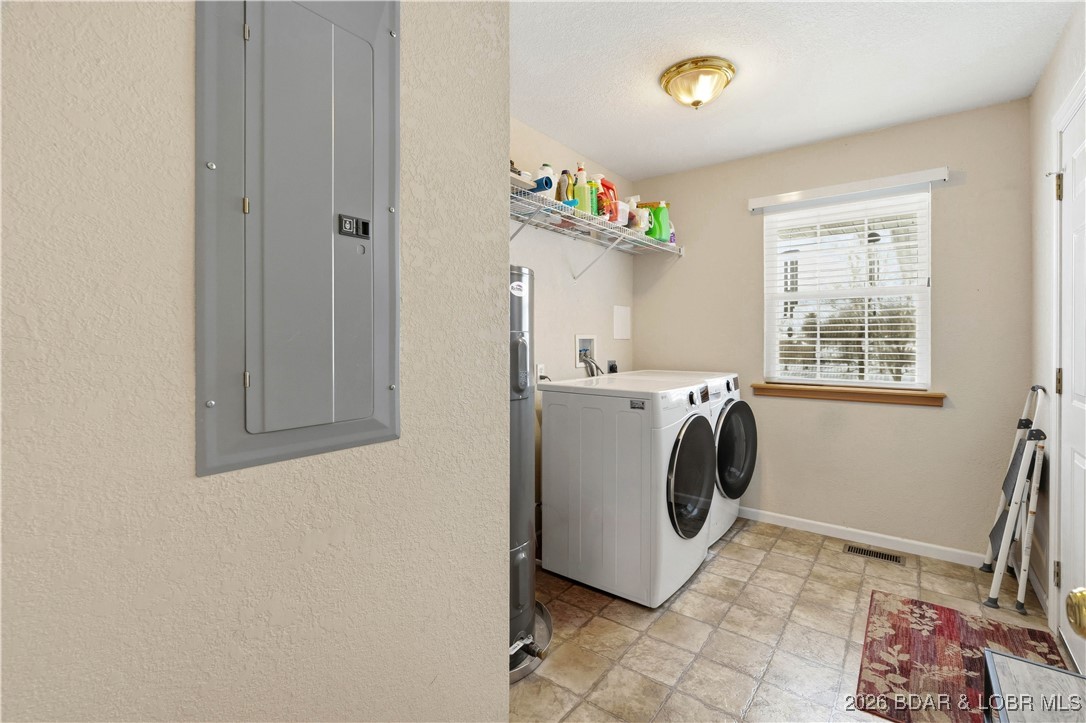 412 West Champain Street Eldon, MO 65026 - Photo 24 of 32 Laundry/mudroom is located directly off the garage
