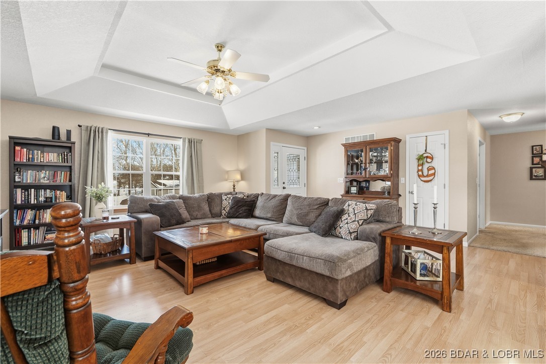 412 West Champain Street Eldon, MO 65026 - Photo 3 of 32 Enter the front door to large living area located