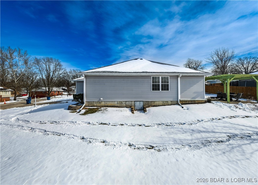 412 West Champain Street Eldon, MO 65026 - Photo 31 of 32 Finished & lighted crawlspace access on side of ho