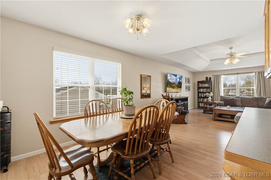 412 West Champain Street Eldon, MO 65026 - Photo 9 of 32 Formal dining room is flooded with natural light &