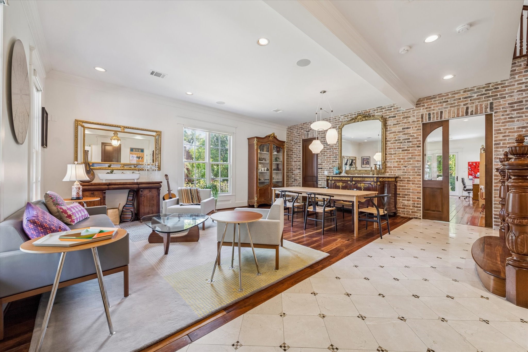 1819 Banks Street Houston, TX 77098 - Photo 11 of 43 a living room with fireplace furniture and a large window