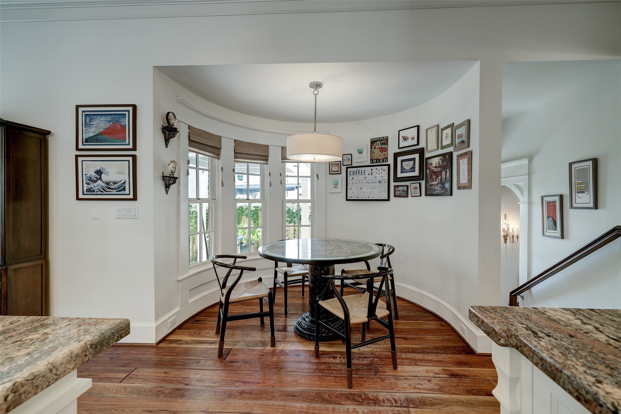 1819 Banks Street Houston, TX 77098 - Photo 21 of 43 a view of a dining room with furniture window and wooden floor