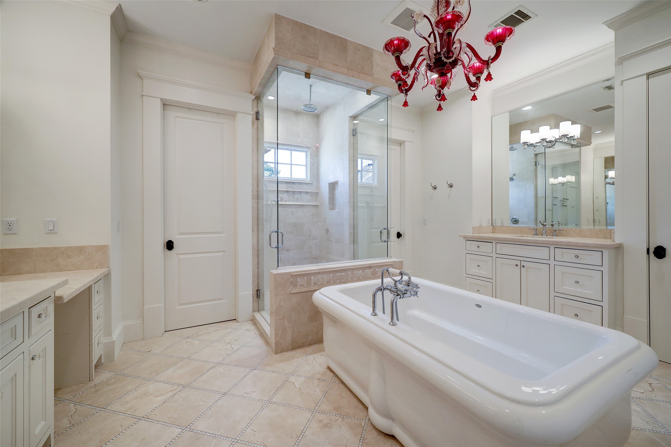 1819 Banks Street Houston, TX 77098 - Photo 24 of 43 a white bath tub sitting next to a bathroom sink