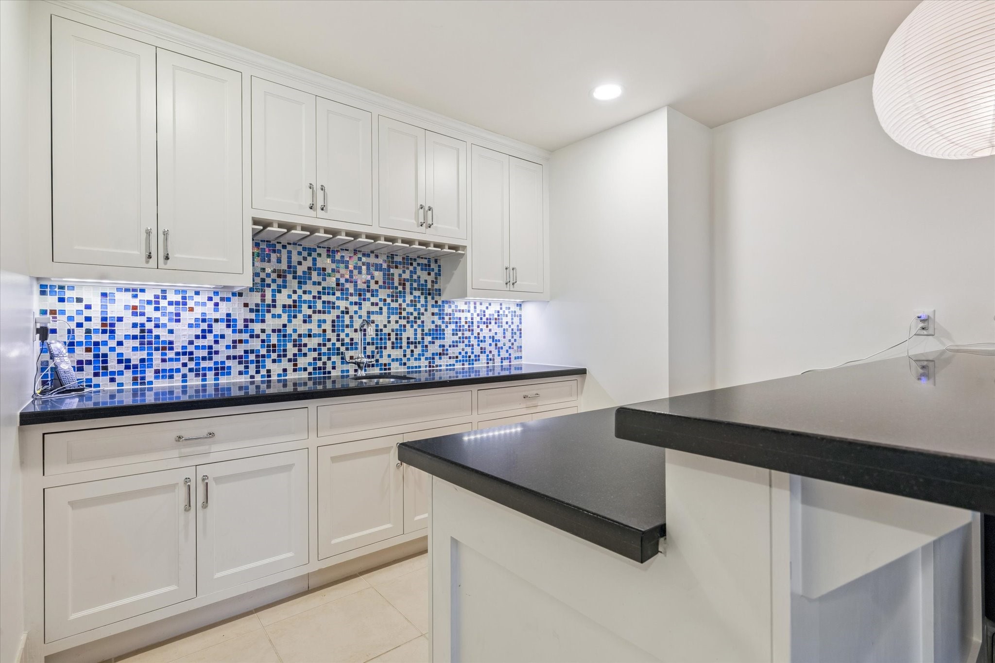 1819 Banks Street Houston, TX 77098 - Photo 32 of 43 a kitchen with white cabinets