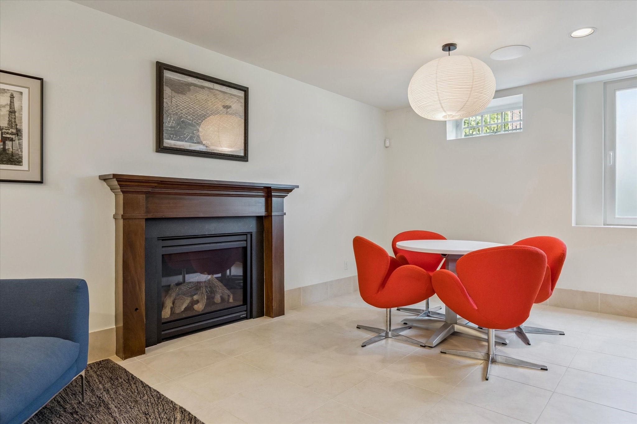 1819 Banks Street Houston, TX 77098 - Photo 33 of 43 a living room with furniture and a fireplace