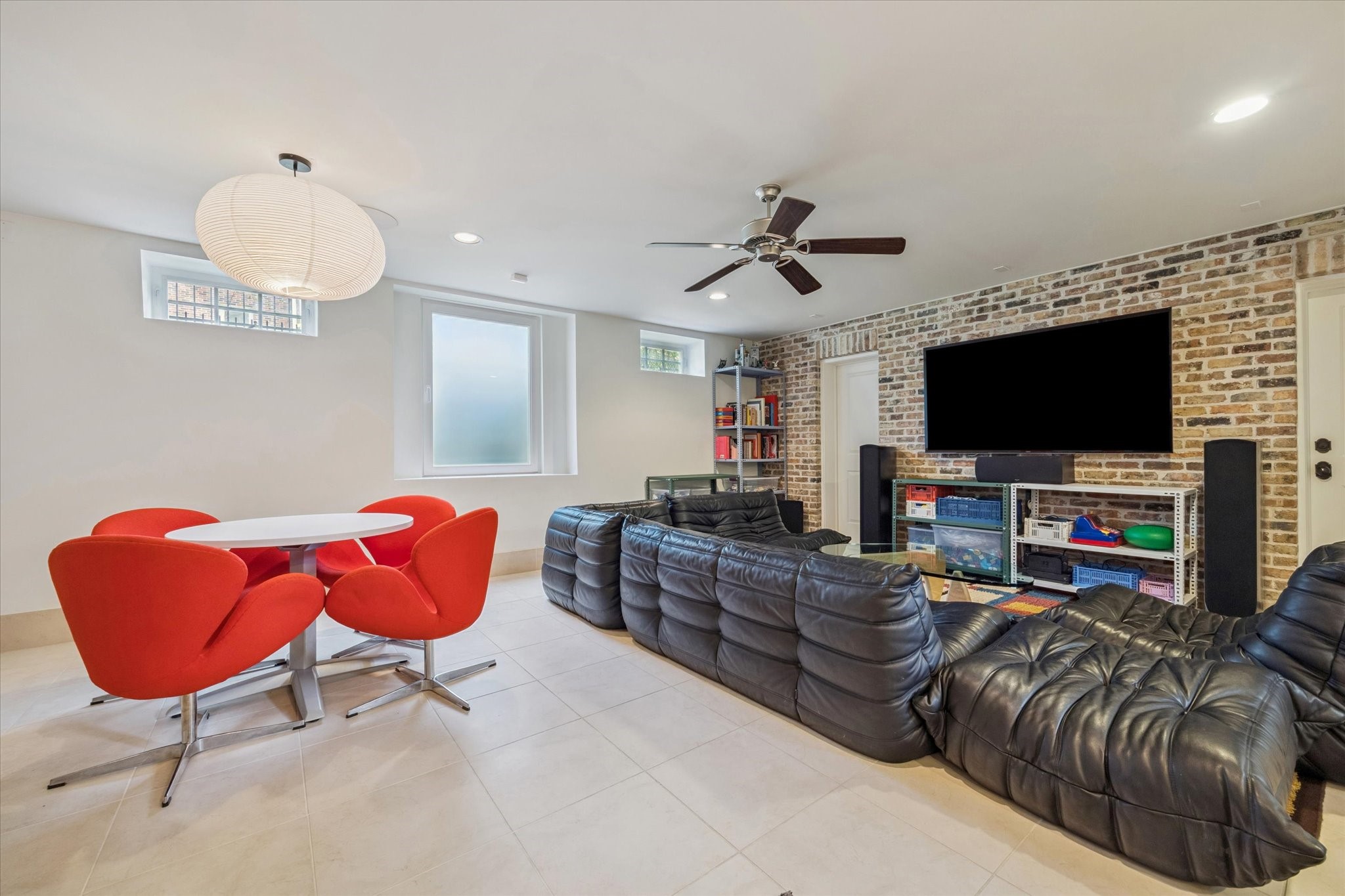 1819 Banks Street Houston, TX 77098 - Photo 34 of 43 a living room with furniture and a flat screen tv