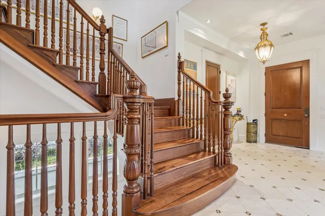 a living room with furniture fireplace and flat screen tv