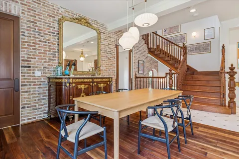 an open kitchen with a table and chairs in it