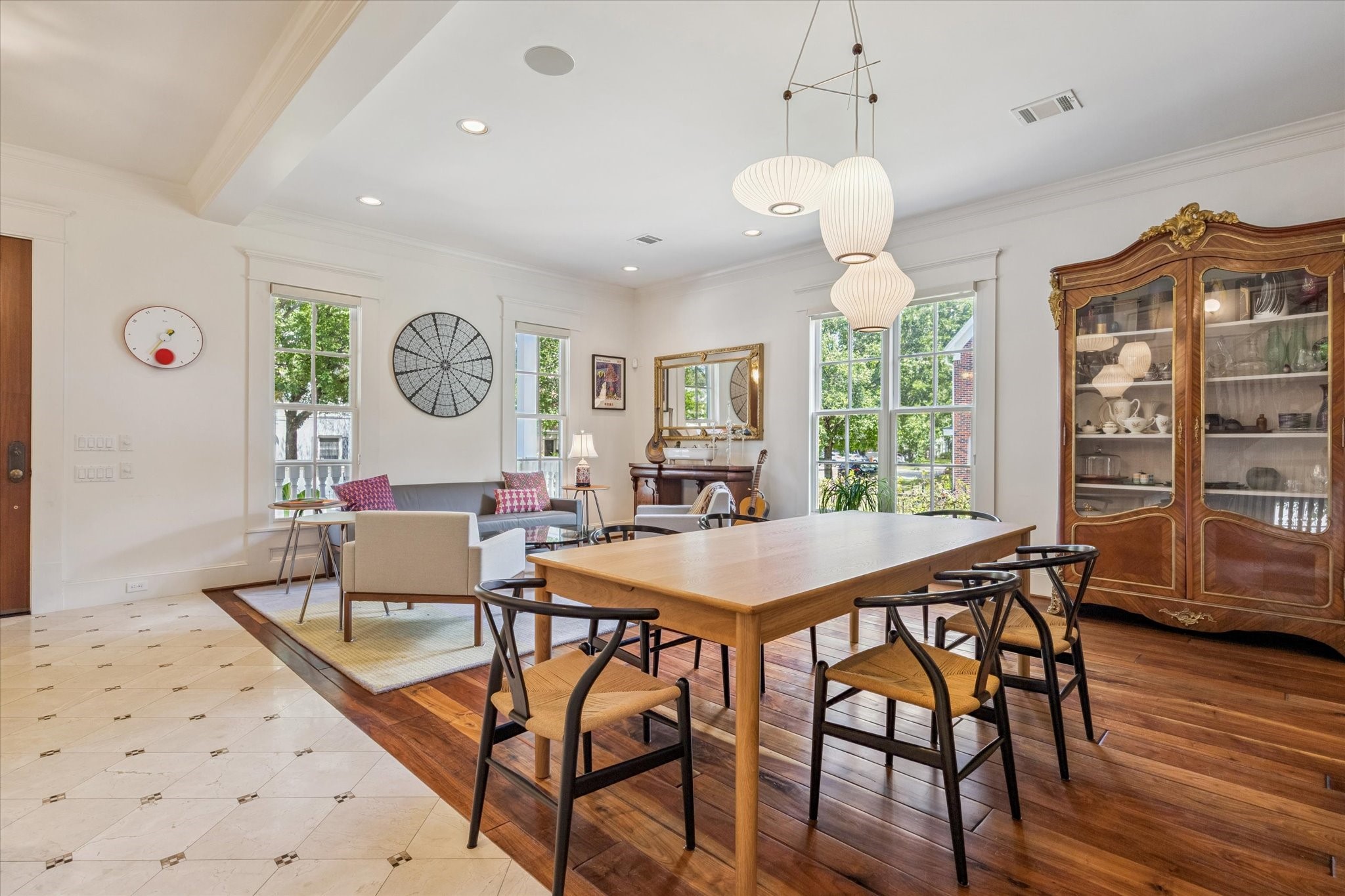 1819 Banks Street Houston, TX 77098 - Photo 8 of 43 a view of a dining room with furniture window and wooden floor