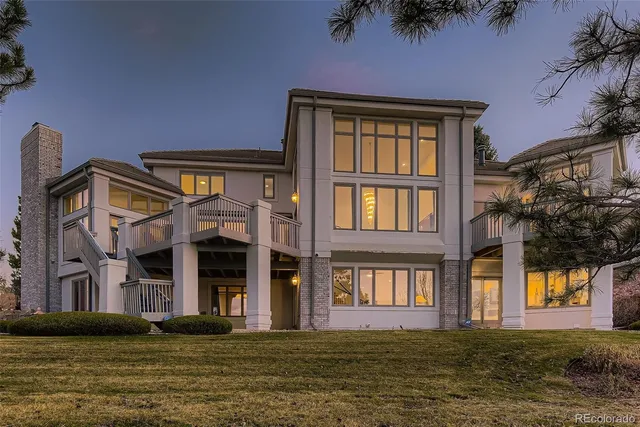 a front view of building with a garden
