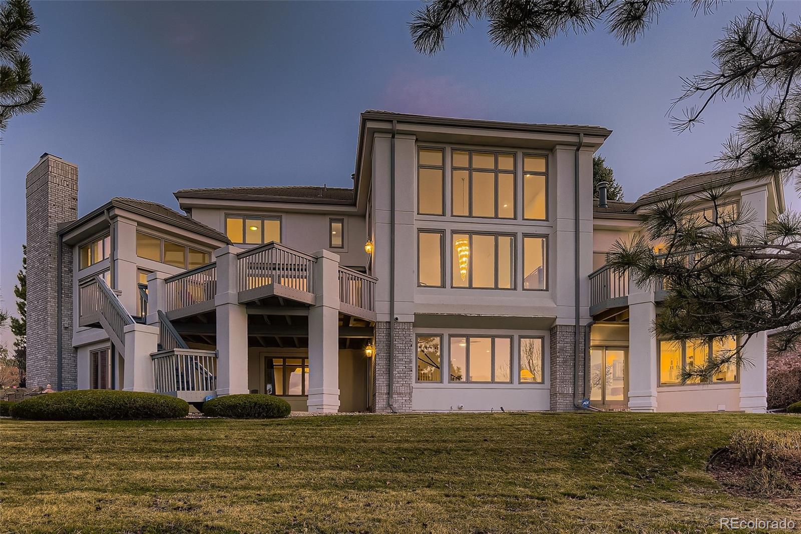 8561 Colonial Drive Lone Tree, CO 80124 - Photo 2 of 50 a front view of building with a garden