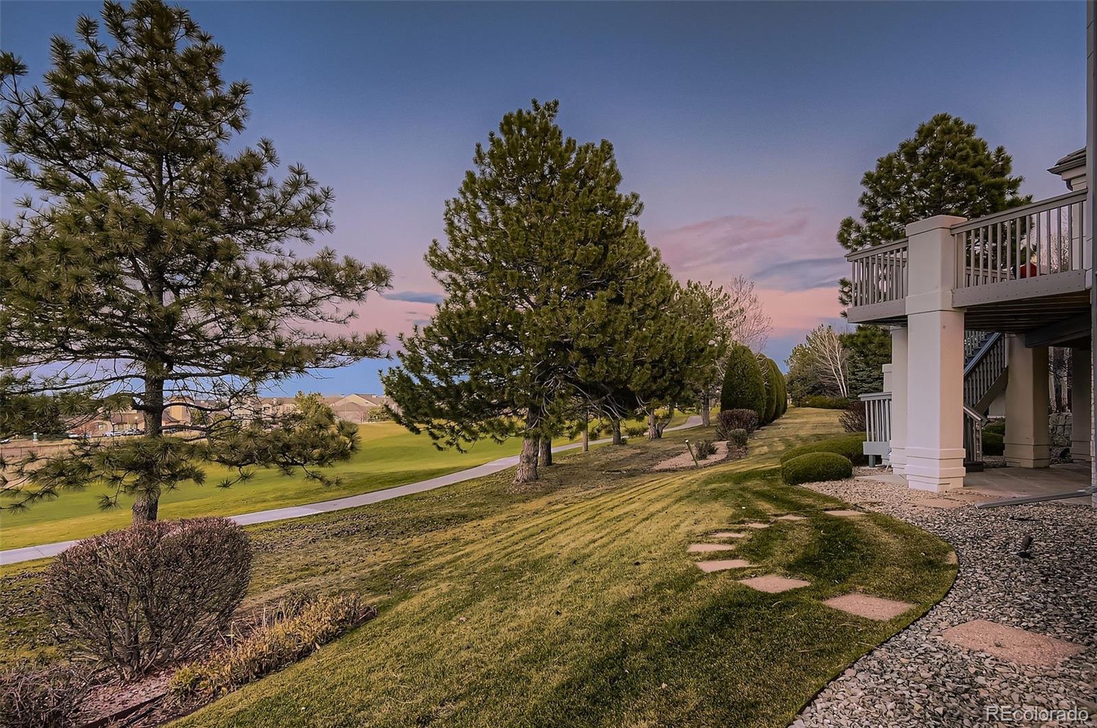 8561 Colonial Drive Lone Tree, CO 80124 - Photo 4 of 50 a view of a garden with an outdoor space