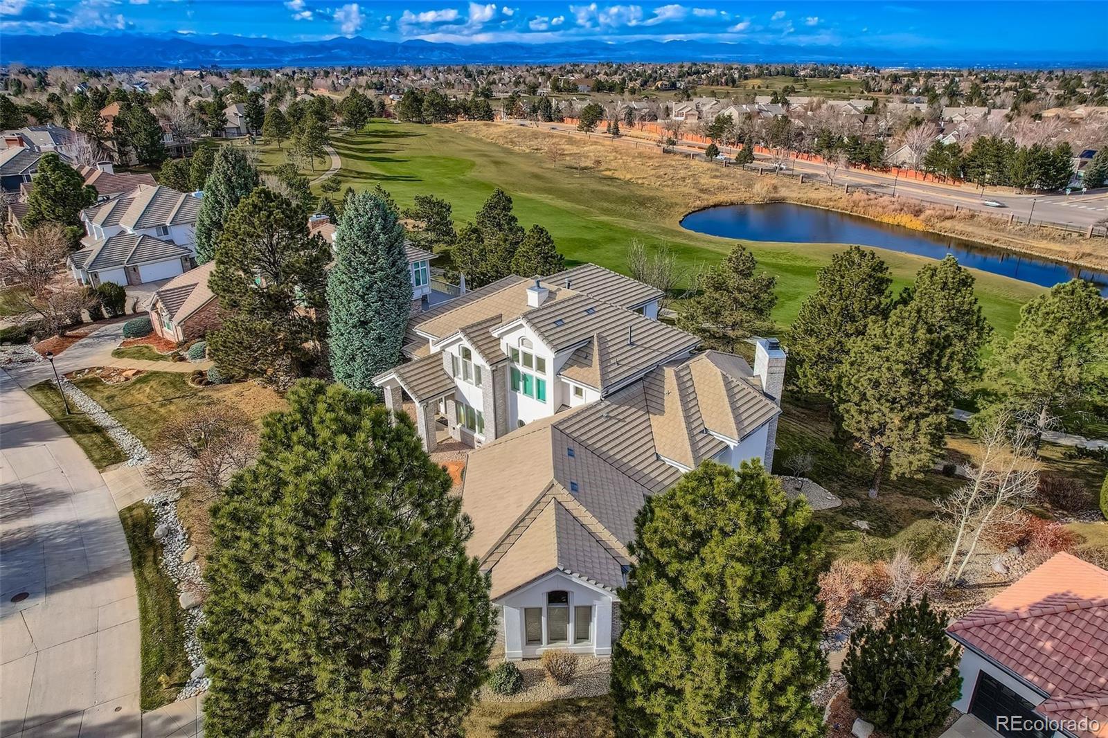 8561 Colonial Drive Lone Tree, CO 80124 - Photo 45 of 50 an aerial view of residential houses with outdoor space and river