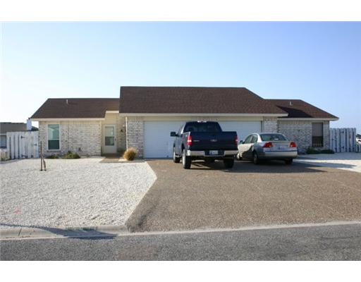15641 Cruiser Street, Unit B Corpus Christi, TX 78418 - Photo 1 of 2 a car parked in front of house