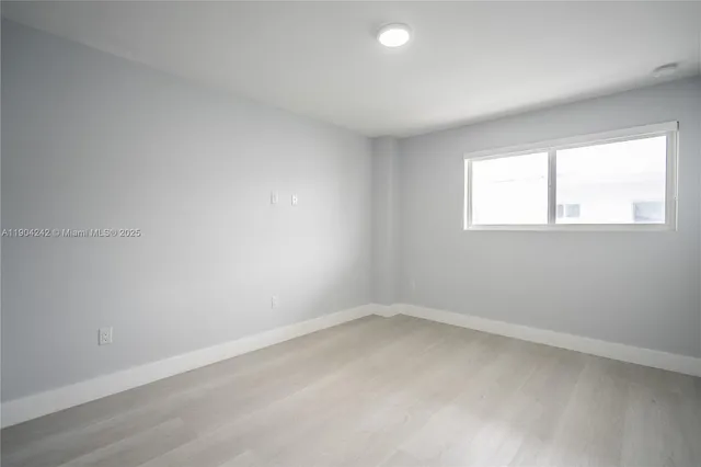 an empty room with a window