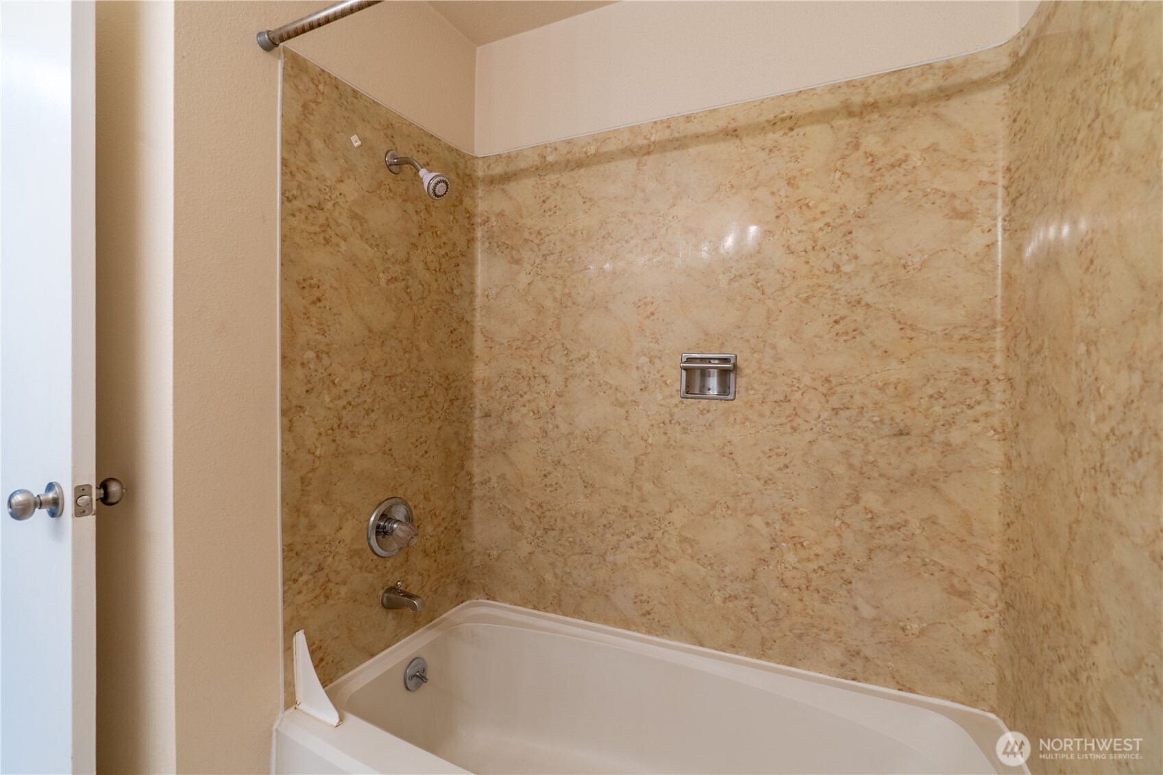 230 Southwest Clark Street, Unit C203 Issaquah, WA 98027 - Photo 12 of 22 a bathroom with a bathtub