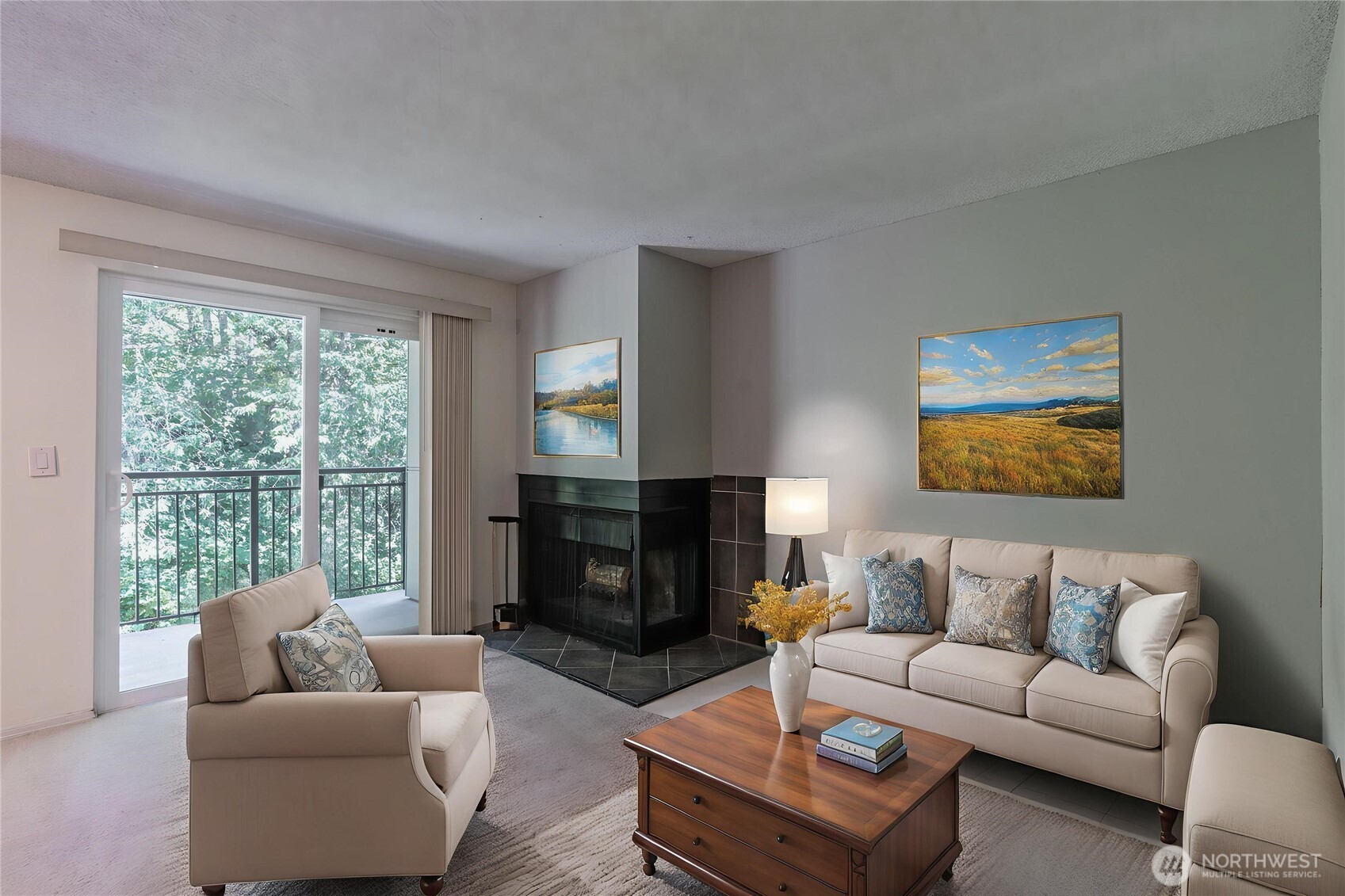 230 Southwest Clark Street, Unit C203 Issaquah, WA 98027 - Photo 2 of 22 a living room with furniture a large window and a fireplace
