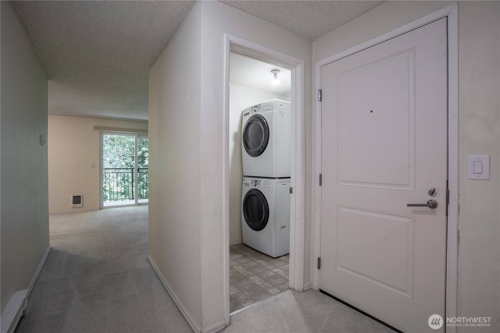 230 Southwest Clark Street, Unit C203 Issaquah, WA 98027 - Photo 7 of 22 a view of entryway and hall with wooden floor