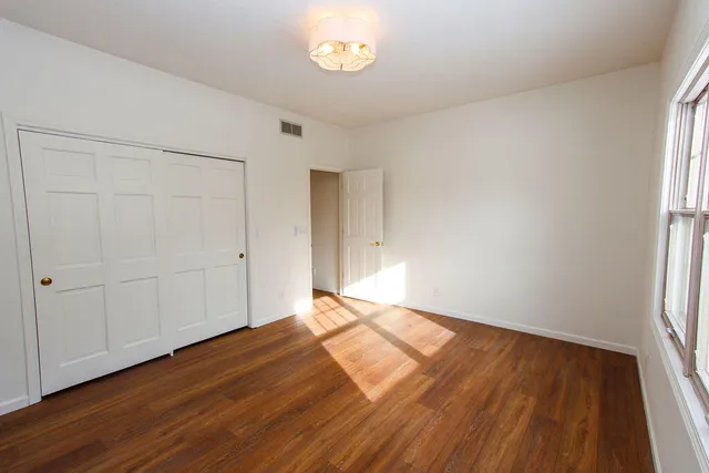 a bathroom with a tub and a sink