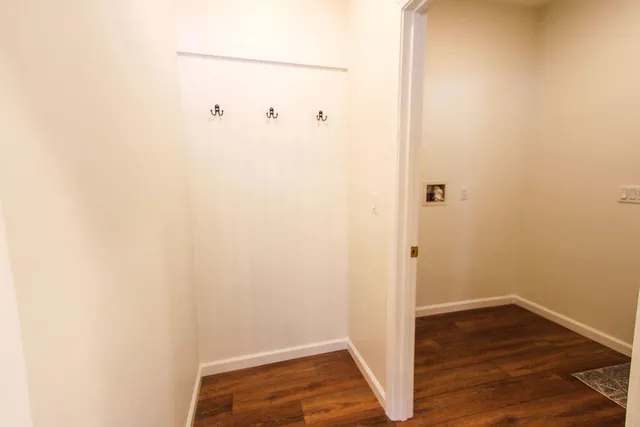 a view of the house with a yard