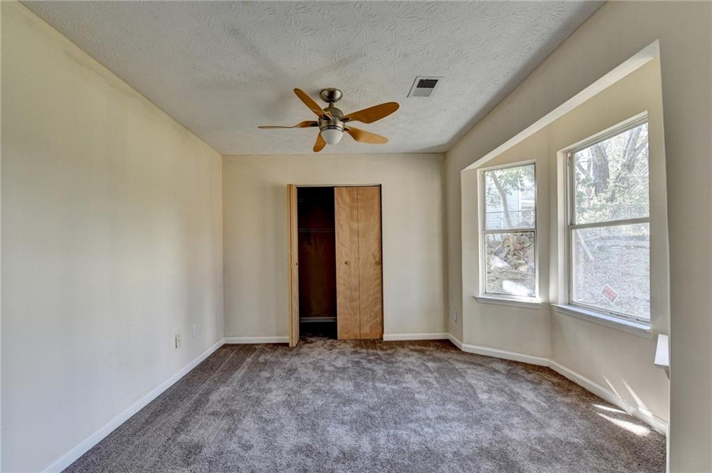 2082 Montgomery Trail Duluth, GA 30096 - Photo 23 of 45 a view of an empty room with a window